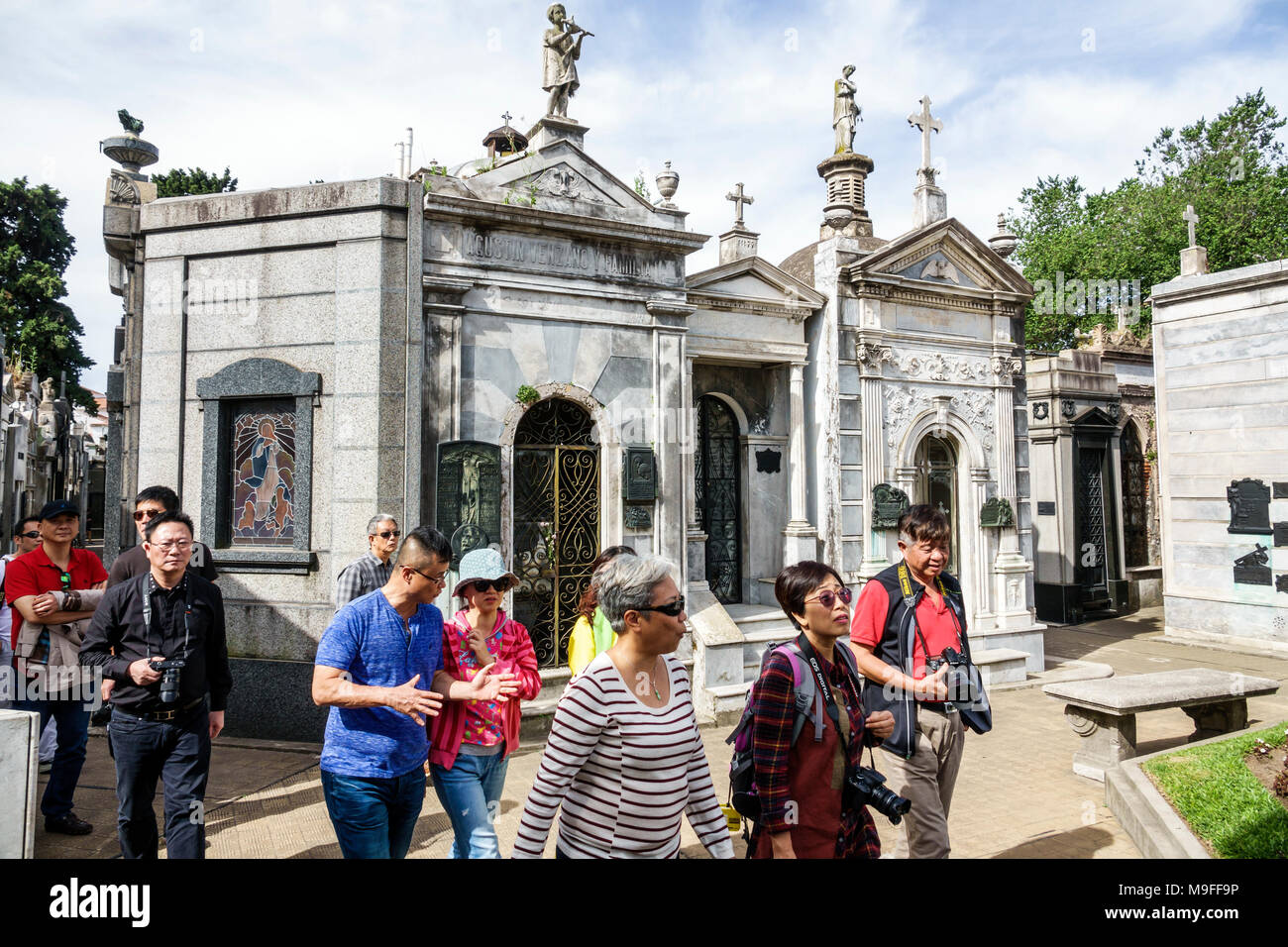 Buenos Aires Argentina,Cementerio de la Recoleta Cemetery,historic,tombs statues,mausoleums,marble,Asian Asians ethnic immigrant immigrants minority,a Stock Photo