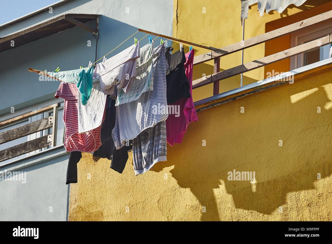 Clothes Hanging Outside Stock Photo