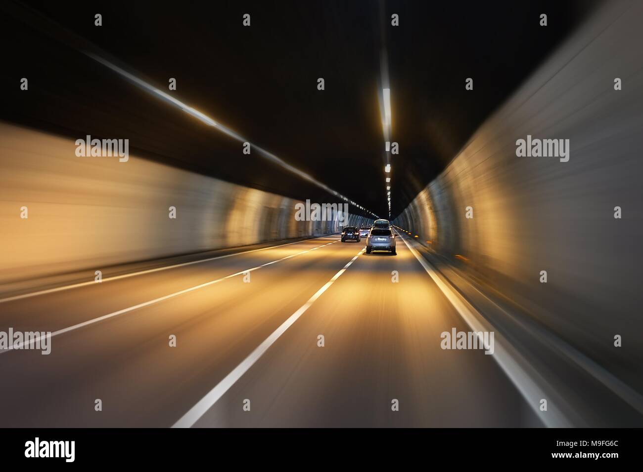 Driving in a tunnel Stock Photo