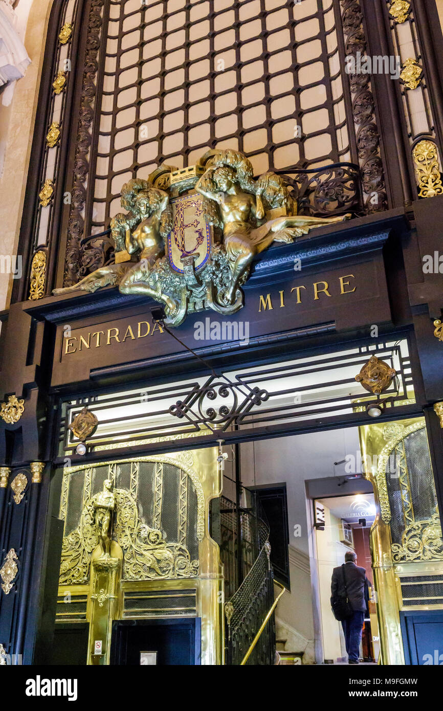 Buenos Aires Argentina,Florida Street,Galeria Guemes,commercial shopping gallery,art nouveau style architecture,interior inside,elevator,bronze panel, Stock Photo