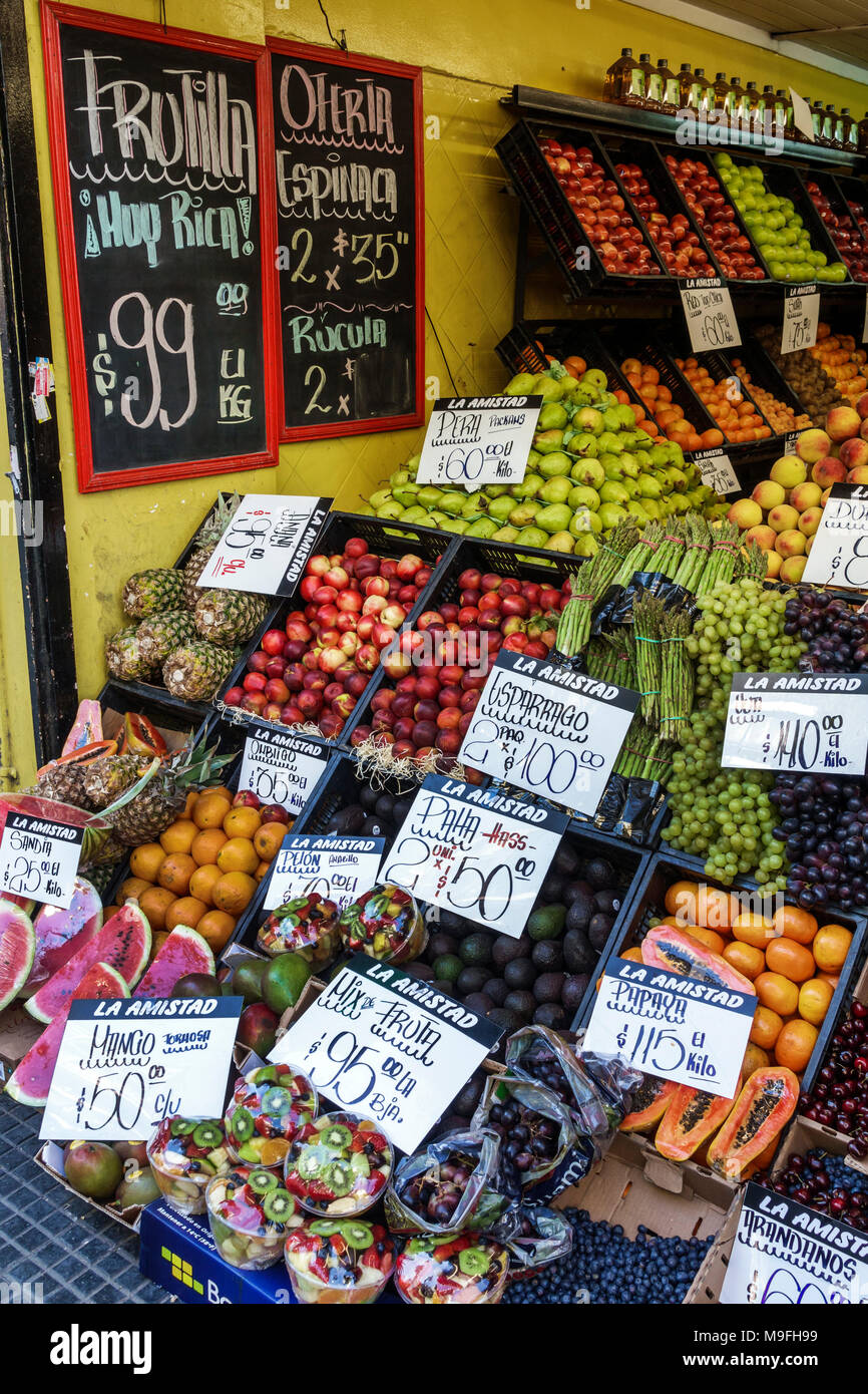Buenos Aires Argentina,Belgrano,produce fruit market,sign,kilo,Kg,display,melon,nectarines,pears,grapes,oranges,papaya,plums,display sale Hispanic,ARG Stock Photo