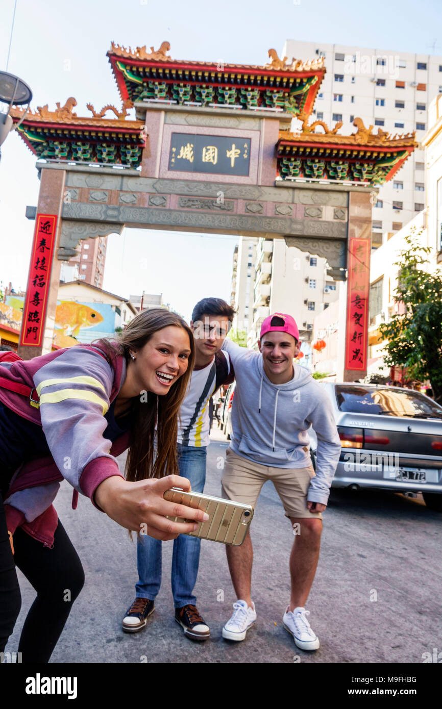 Buenos Aires Argentina,Belgrano,China Town Barrio Chino Chinatown neighborhood,Paifang,gate,Chinese architectural arch,boy boys,male kid kids child ch Stock Photo