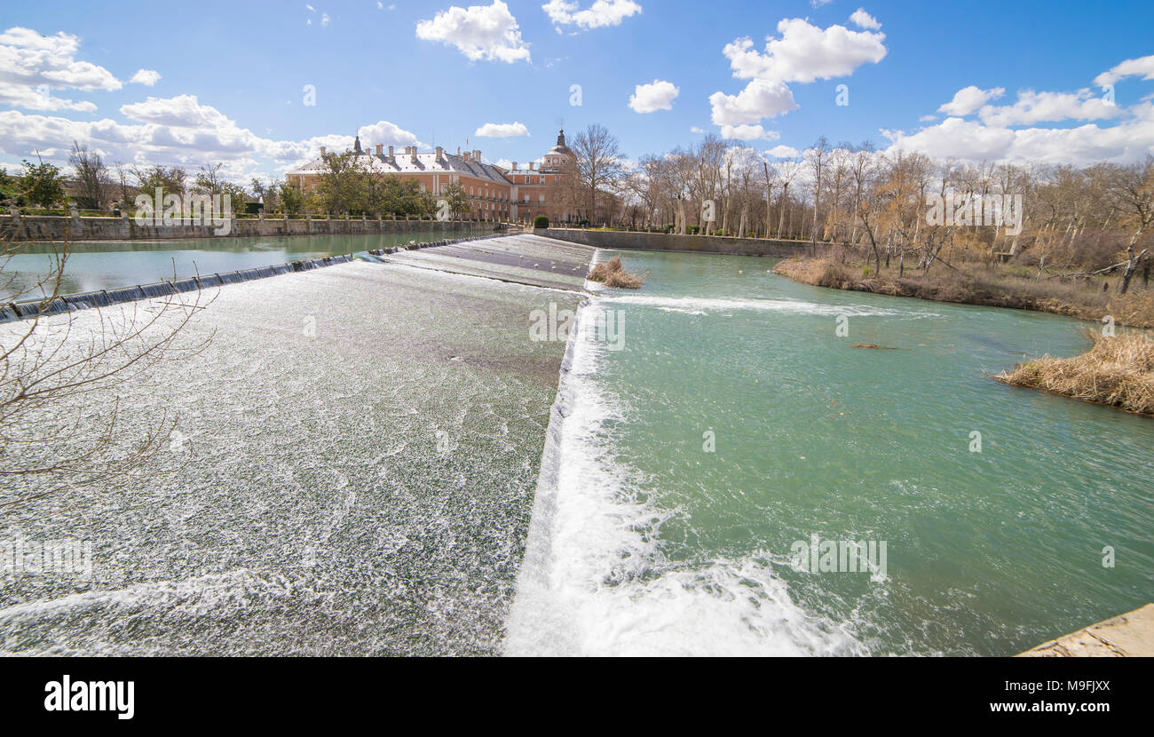 The Tajo River next to the Palace of Aranjuez. waterfalls with ducks ...