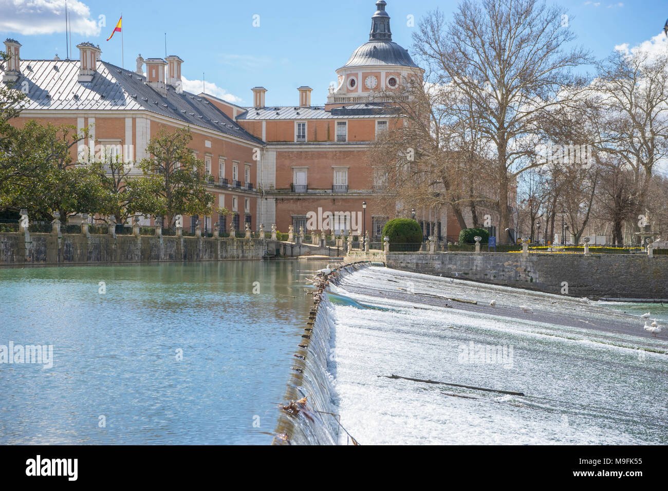 Tourism, The Tajo River next to the Palace of Aranjuez. waterfalls with ...