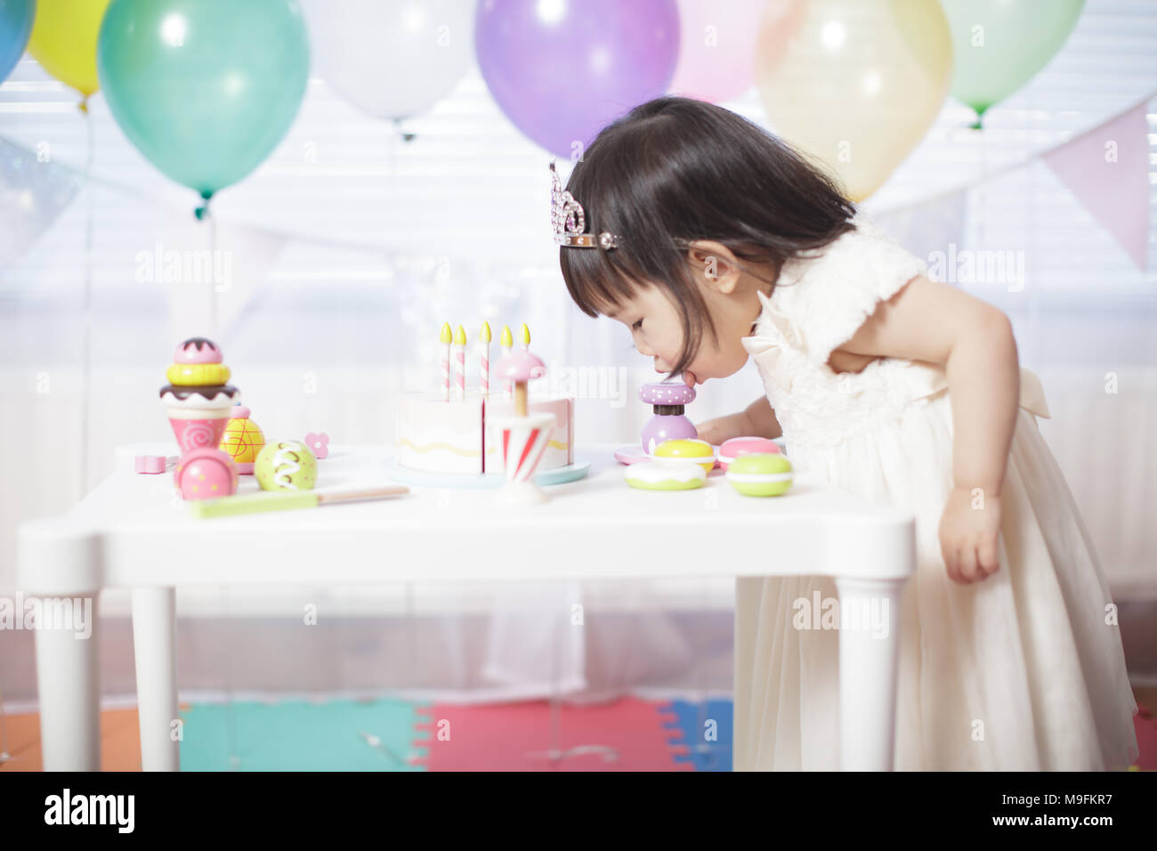 Baby girl celebrate her second birthday Stock Photo