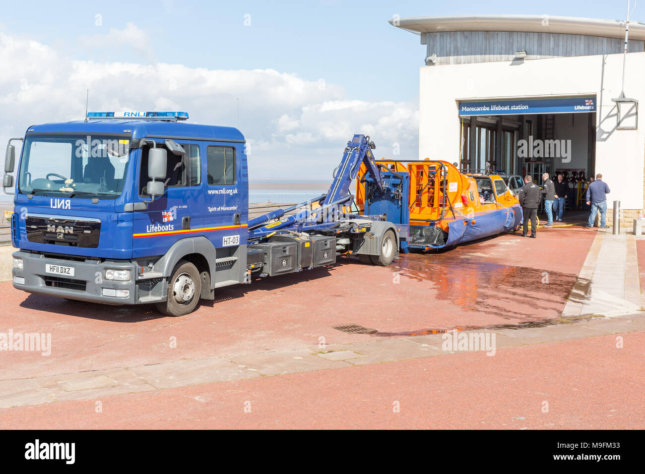 The Morecambe Bay RNLI hovercraft being washed down with fresh water after being called out to a rescue Stock Photo