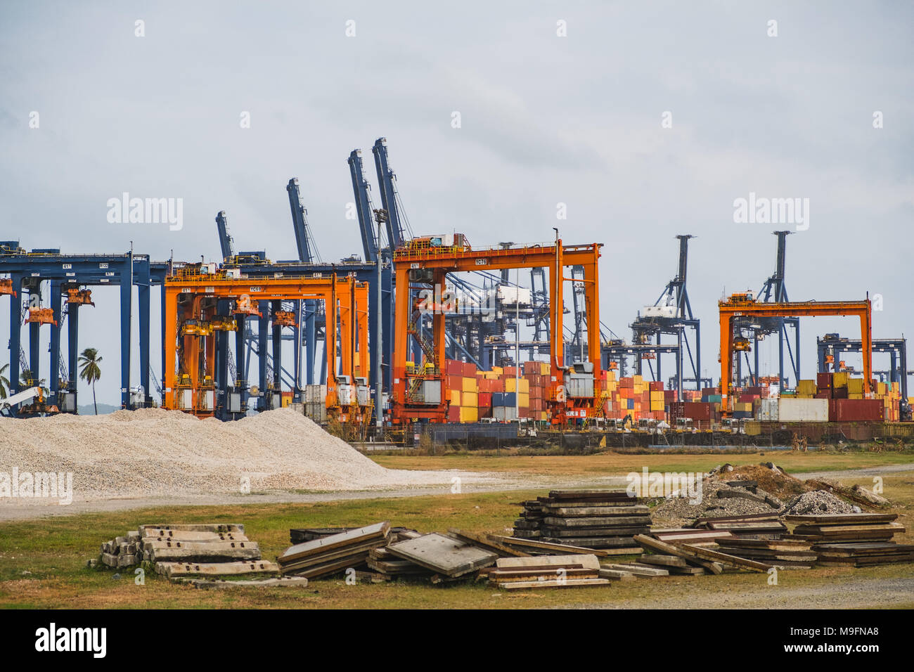 logistics, shipping concept - container and cranes  at  freight port - Stock Photo