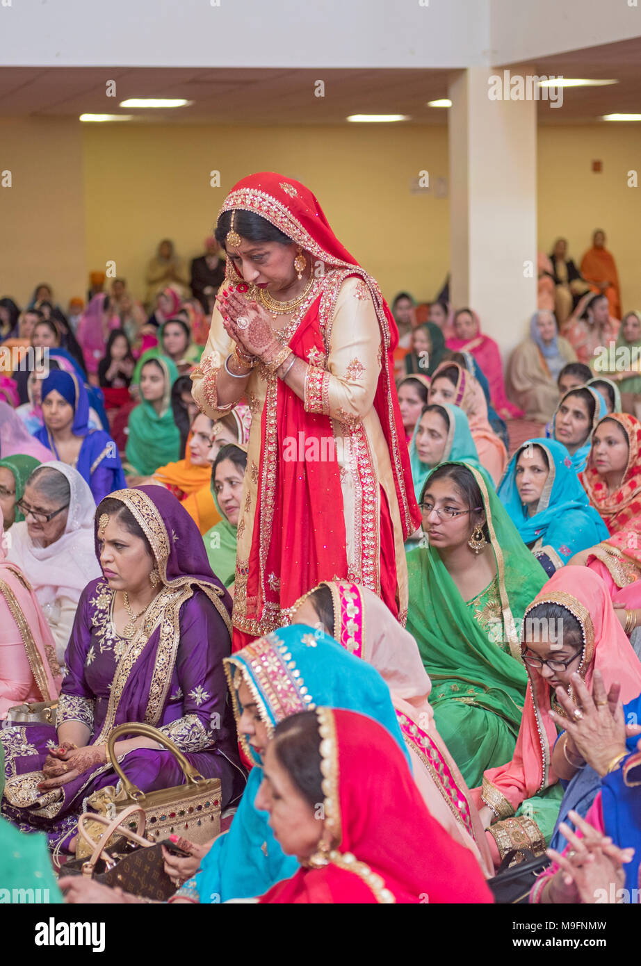 Portrait of a Sikh woman wedding guest at the Gurdwara Sikh Cultural