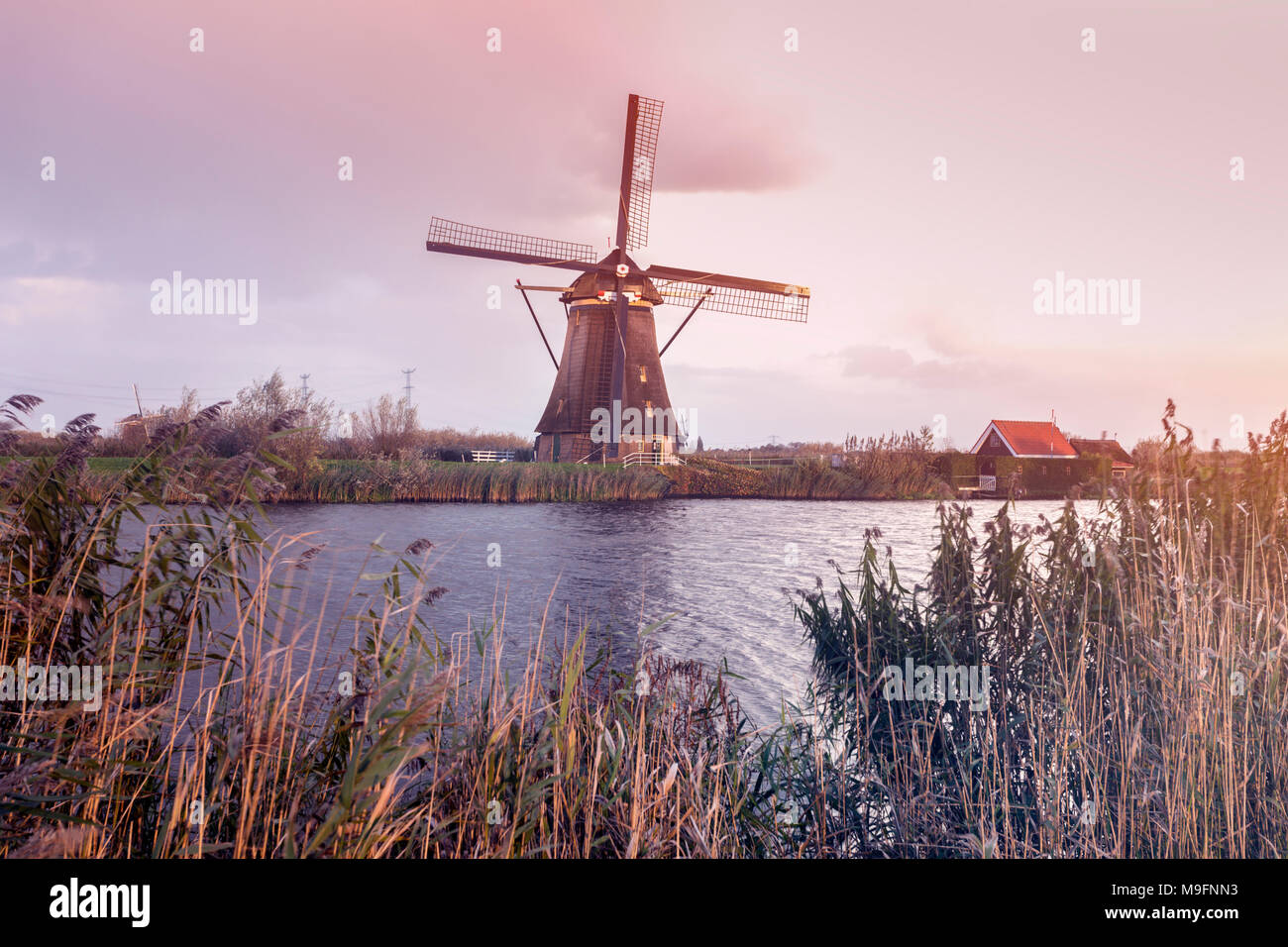 Windmills at Kinderdijk at sunset. Kinderdijk, South Holland, Netherlands Stock Photo
