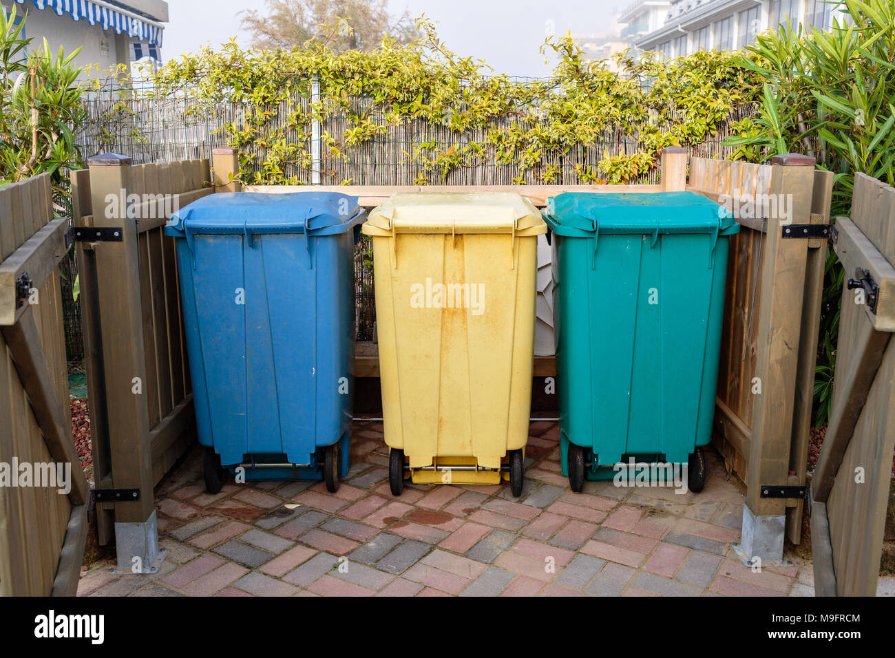 Three types of waste separation tanks on the beach in Italy. Hazardous
