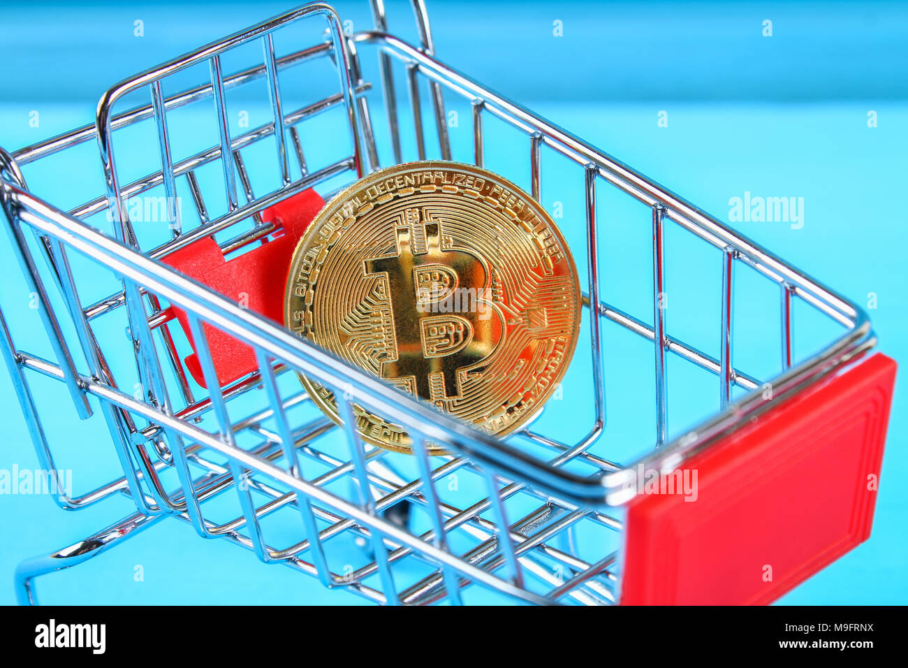 Shopping trolley cart with Coins bitcoin, buying goods for crypto currency  Stock Photo - Alamy