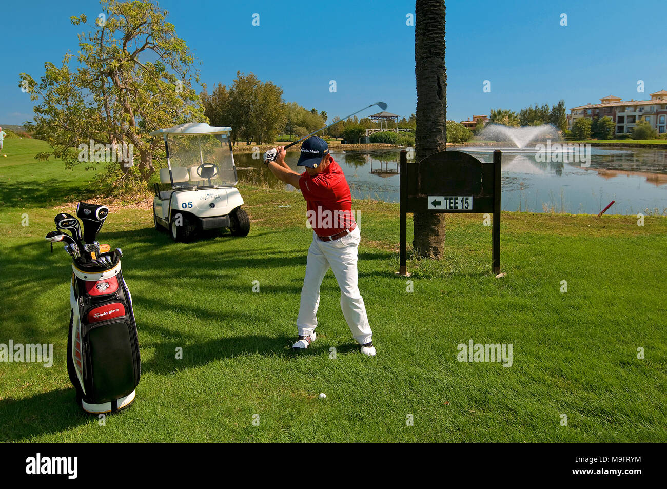 Isla Canela Golf - golfer hitting the ball. Ayamonte. Huelva province. Region of Andalusia. Spain. Europe Stock Photo
