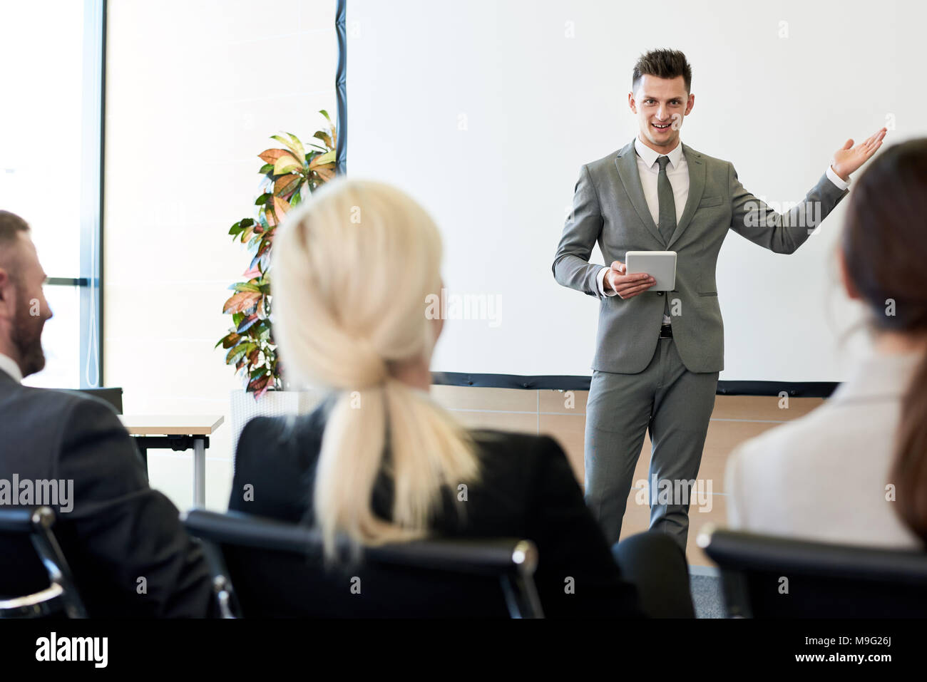 Business Coach Giving Speech Stock Photo