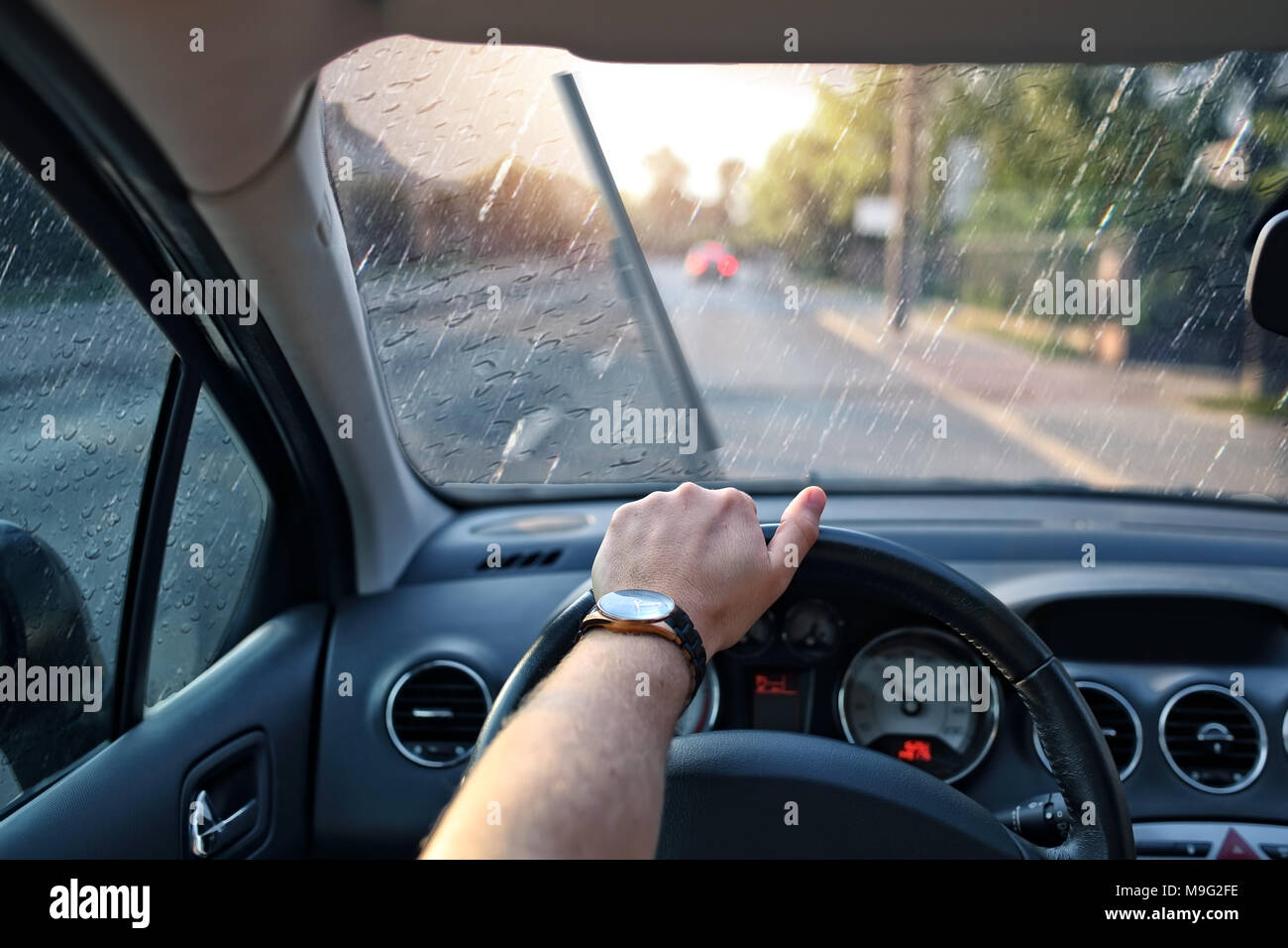 driving in the rain with the wipers on Stock Photo Alamy