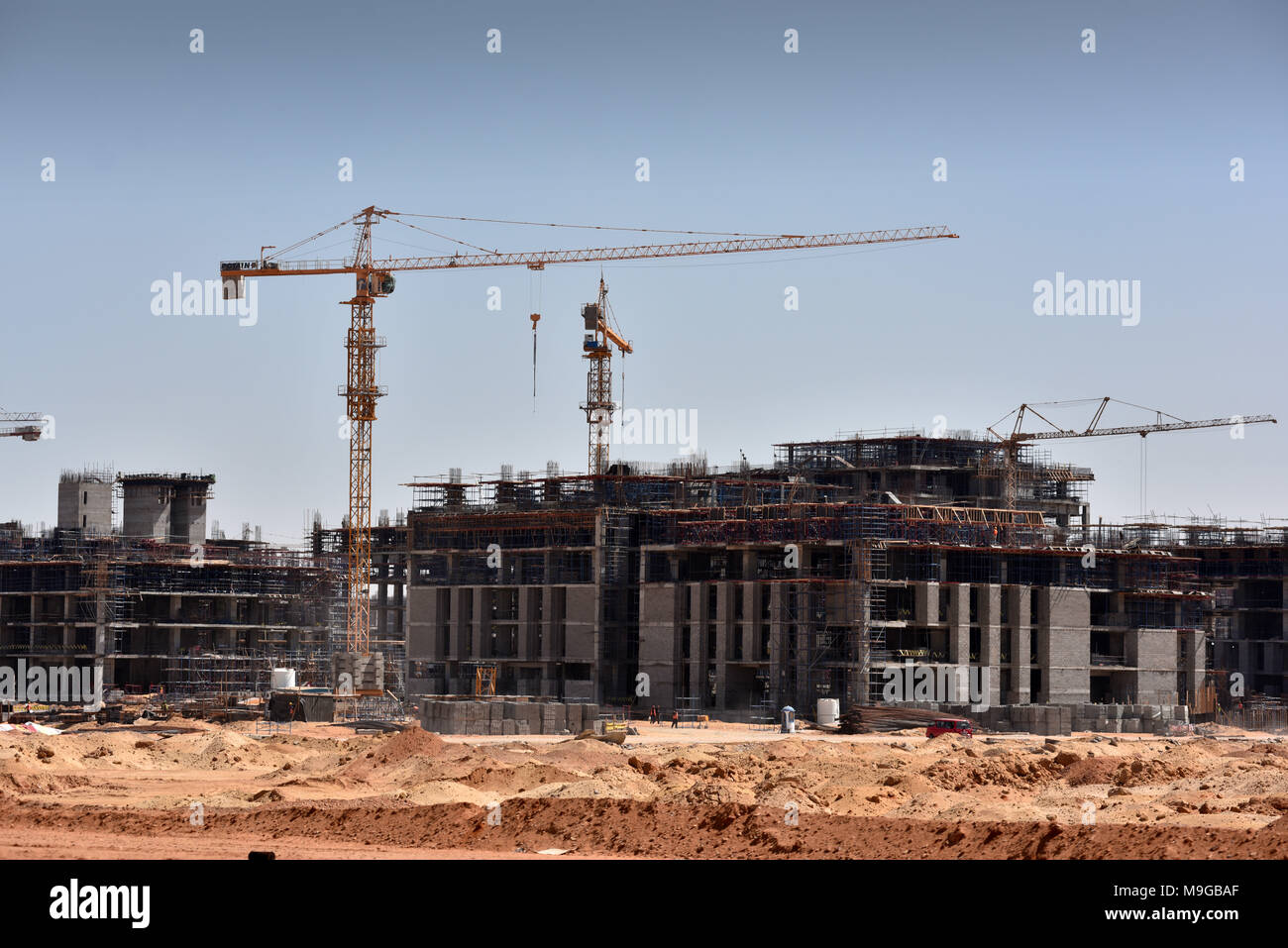ministries-under-construction-in-the-future-government-quarter-of-the-new-administrative-capital-capital-cairo-pictured-on-13-march-2018-the-construction-of-a-new-capital-of-egypt-is-a-mega-project-announced-by-president-abdel-fattah-el-sisi-at-an-economic-summit-in-2015-it-is-to-be-built-at-a-distance-of-about-60-km-from-the-old-capital-cairo-in-the-direction-of-the-red-sea-coast-on-an-area-of-more-than-700-square-kilometers-the-first-agencies-ministries-banks-and-offices-are-to-move-as-early-as-2019-and-start-their-work-in-the-new-administrative-metropolis-capital-cairo-usage-worl-M9GBAF.jpg