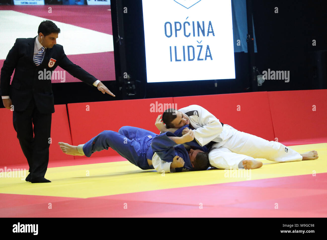 Sarajevo, Bosnia and Herzegovina. 25th Mar, 2018. Ivaylo Dimitrov of Bulgaria competes with Vasilije Vujicic (R) of Bosnia and Herzegovina during the men's  100 kg quarter final at the Junior European Judo Cup Sarajevo 2018 in Sarajevo, Bosnia and Herzegovina, on March 25, 2018. Credit: Haris Memija/Xinhua/Alamy Live News Stock Photo