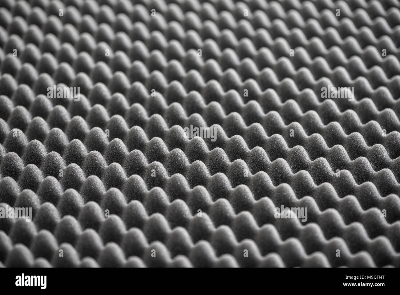 Close up of Sound Absorbing Sponge in Recording Studio. Dampening Acoustical Foam in Music Studio. Acoustic Foam Detail. Stock Photo