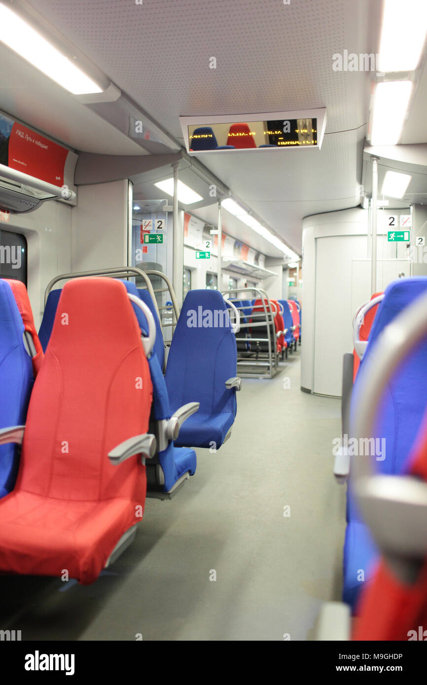 Sochi, Russia - February 13, 2014: Interior of the Lastochka high-speed train during Winter Olympics. Stock Photo