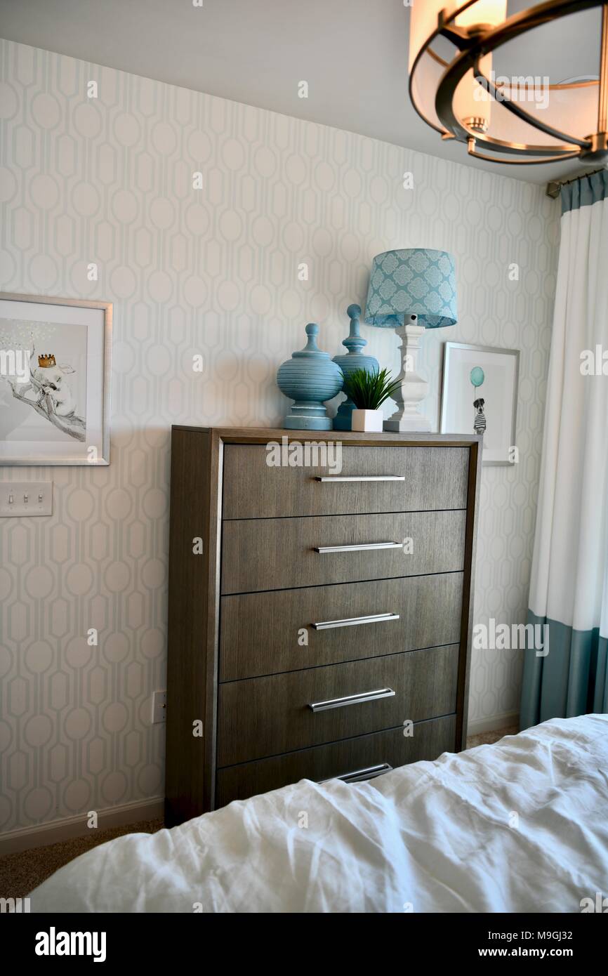 View Of Bedroom Dresser Inside A Decorated Modern Home Stock Photo