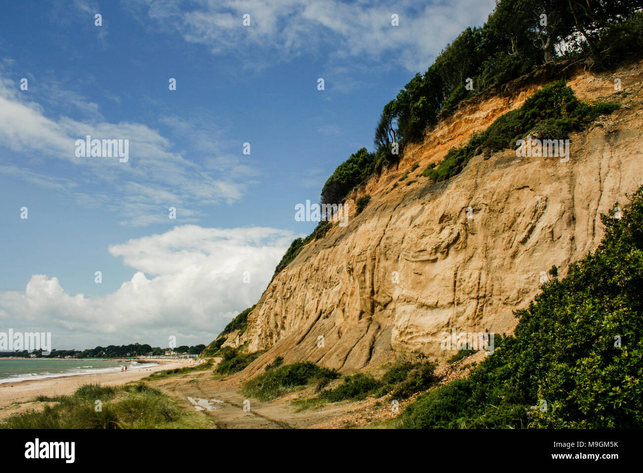 Beach and cliffs view towards Mudeford, near Highcliffe Castle near Christchurch, Doreset, UK Stock Photo