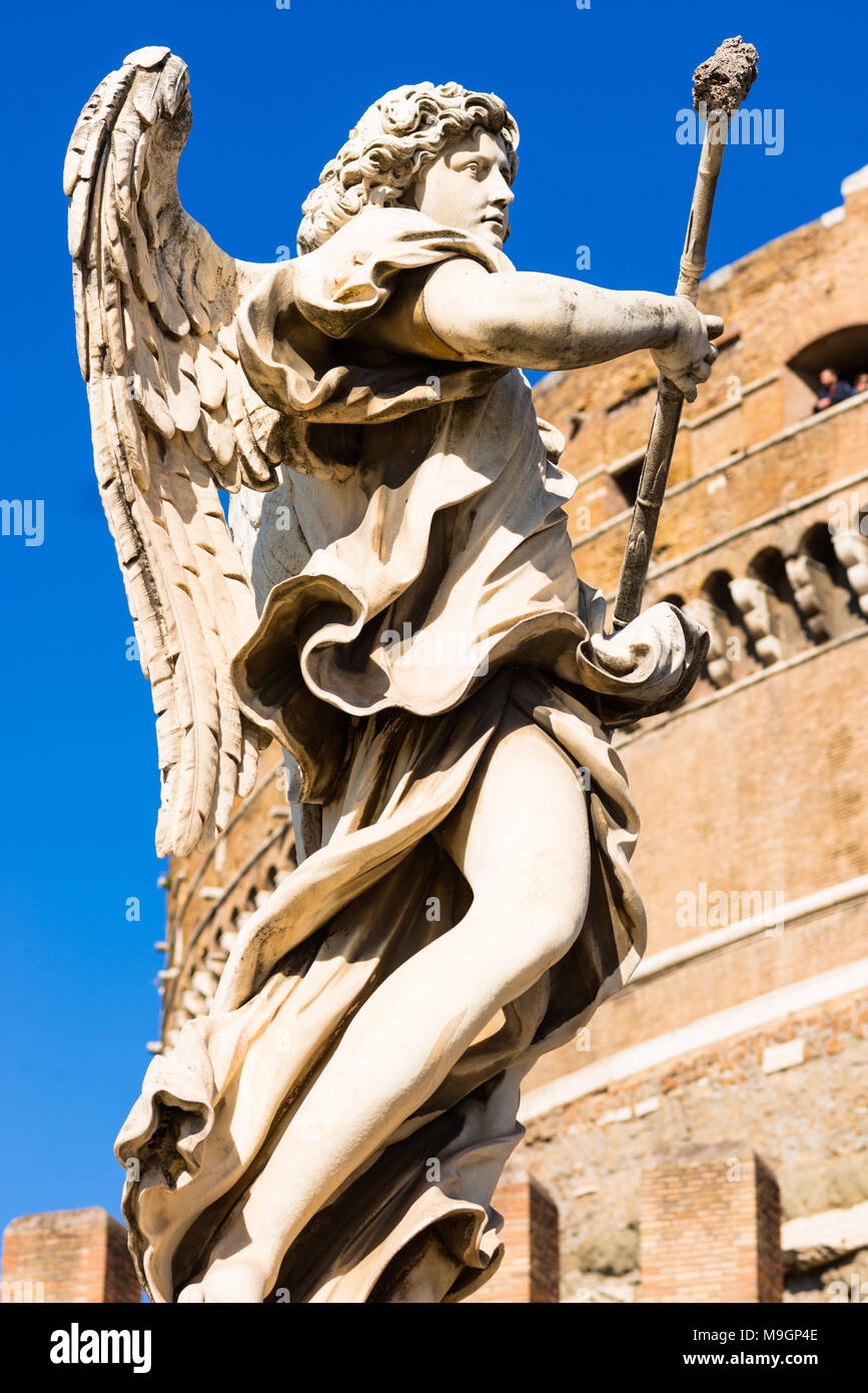 Bernini's baroque angel sculptures on Ponte Sant' Angelo bridge with Castel Sant'Angelo (Castle of Holy angel). Rome. Lazio. Italy. Stock Photo