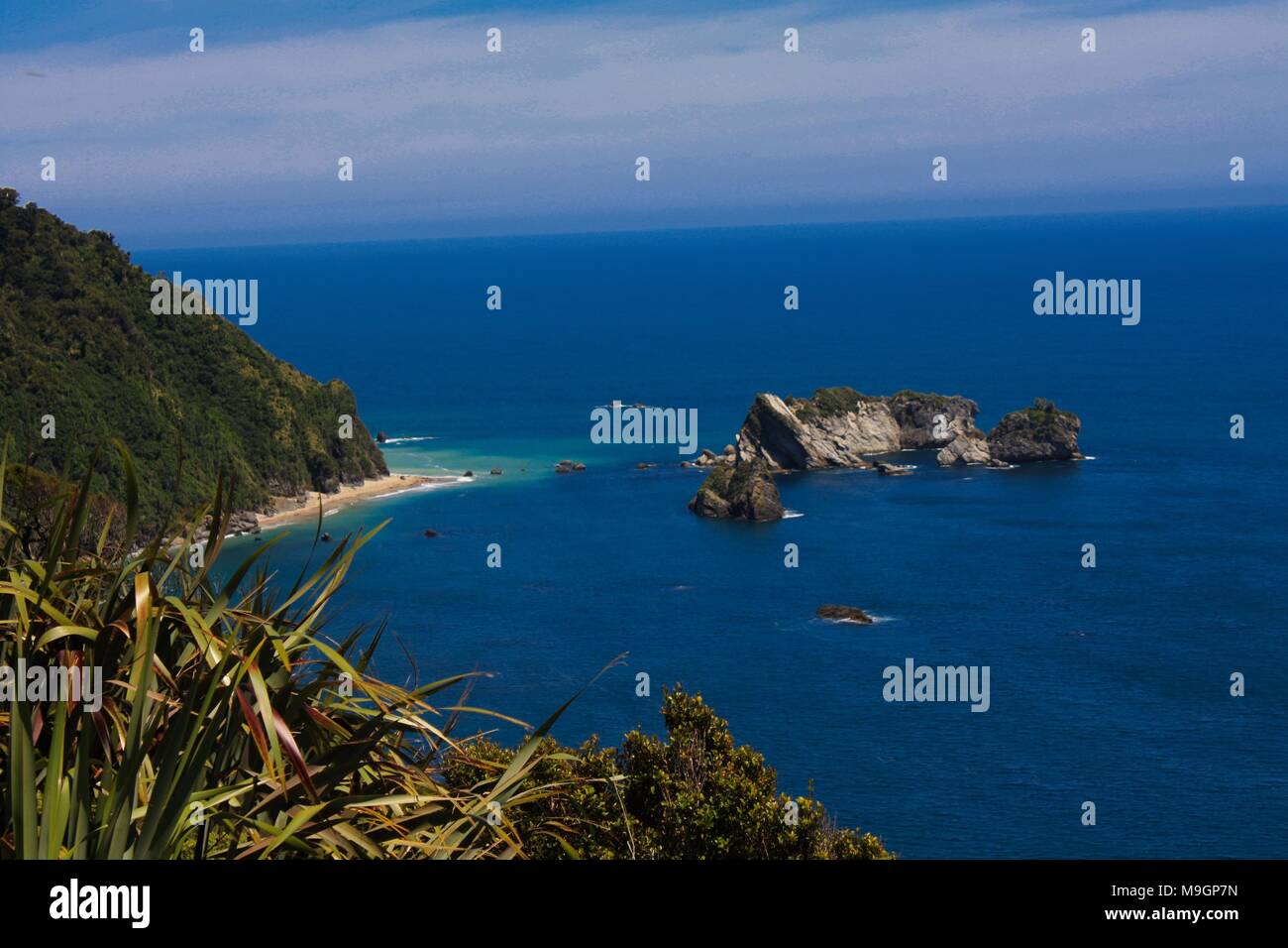 Coastal island, North Island, New Zealand Stock Photo