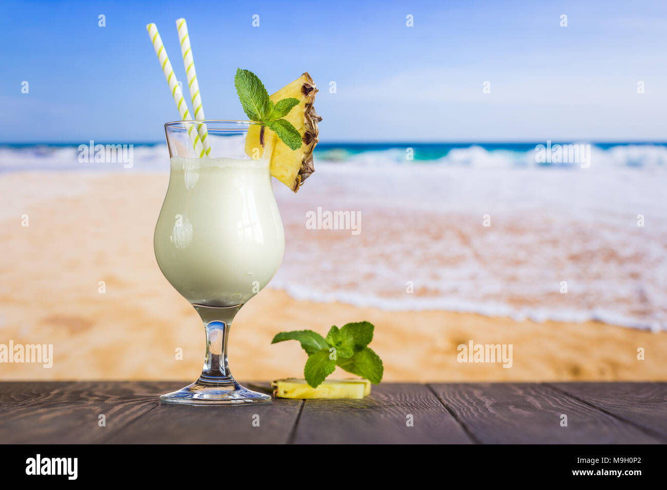 Cold Pina Colada Cocktail In A Glass On The Beach With