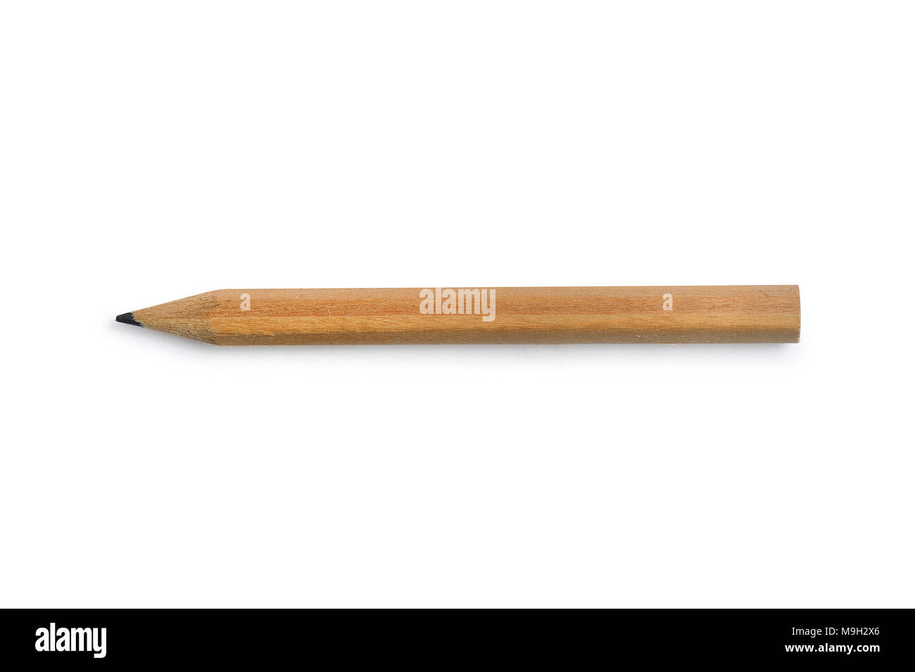 Closeup to natural wooden pencil, isolated clipping mask on white background, top view Stock Photo