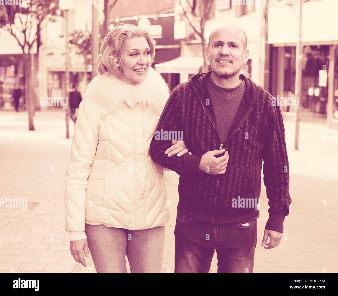 woman and man having a walk together outdoors Stock Photo - Alamy