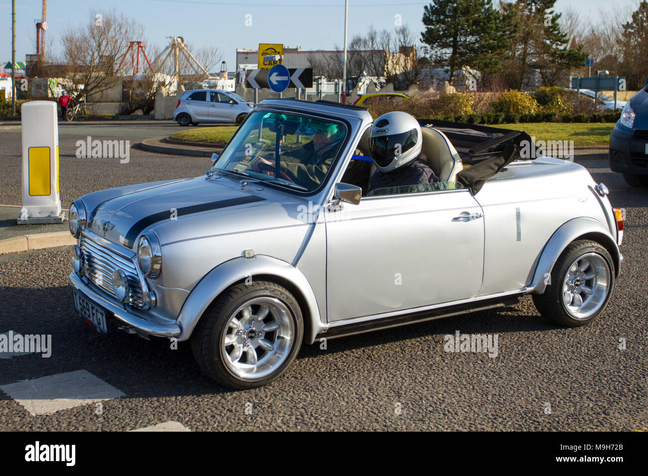 1999 90s Rover Mini Cooper 1275cc blue petrol saloon; convertible, convertibles soft-top, open topped roadster, 90s cabriolets, drop-tops, sportscars, roadster,  cabriolet in Southport, UK Stock Photo