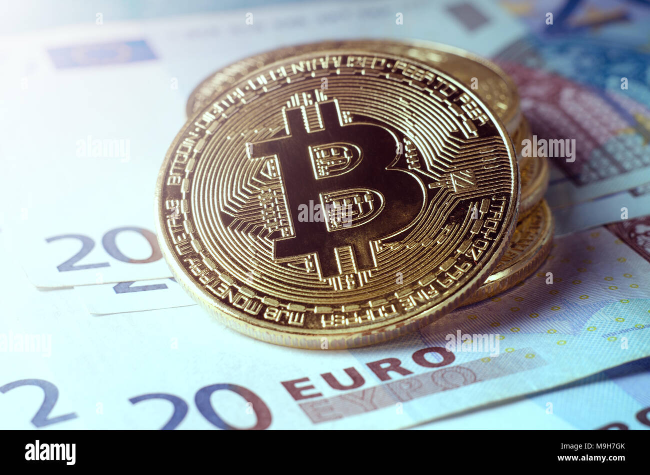 Bitcoin with euro and dollar money bills close up. Big amount of money and  bit coin on table. Business and cryptocurrency concept. Popular and importa  Stock Photo - Alamy