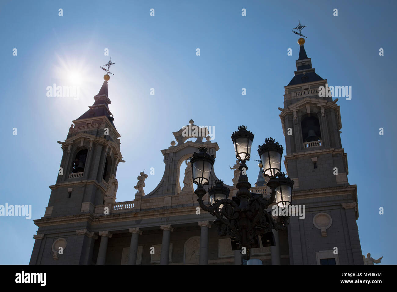 Famous Almudena Cathedral on a bright sunny day Stock Photo