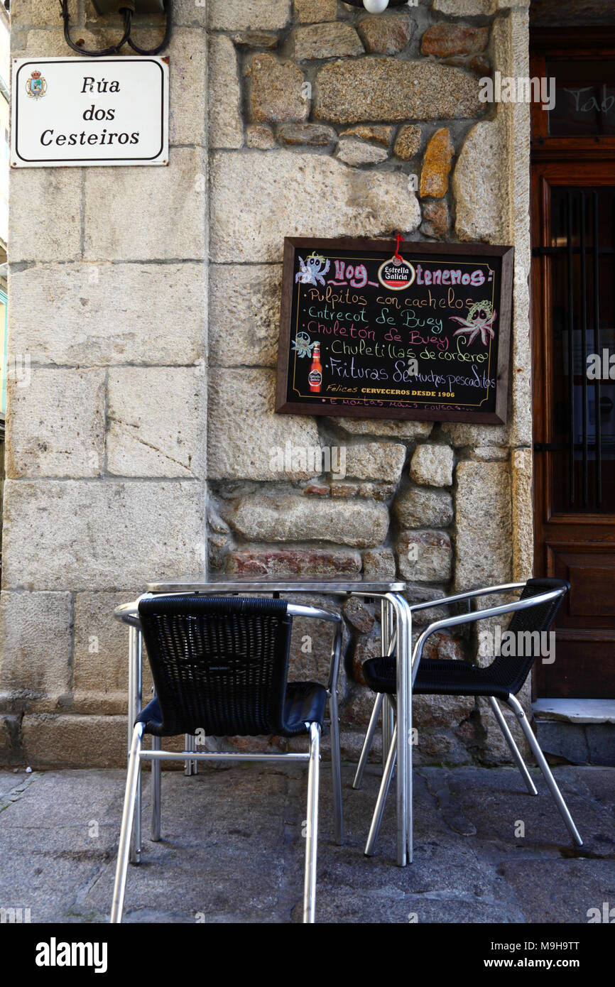 Menu hanging on wall outside cafe in Casco Viejo / Historic Old Town, Vigo, Galicia, Spain Stock Photo