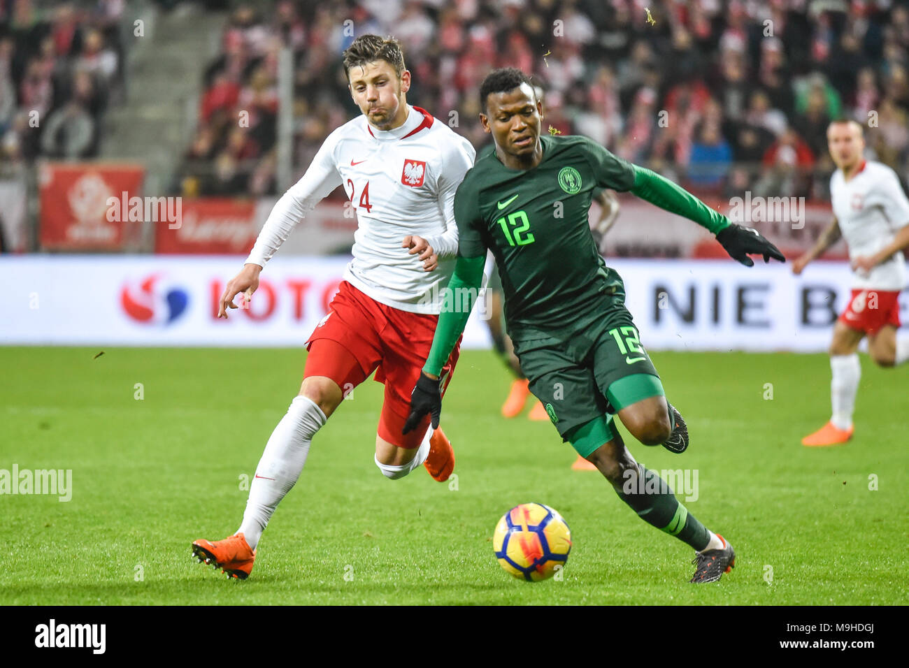 WROCLAW, POLAND - MARCH 23, 2018: Friendly match Poland vs Nigeria 0:1. In action Dawid Kownacki (L) and Abdullahi Shehu (R). Stock Photo