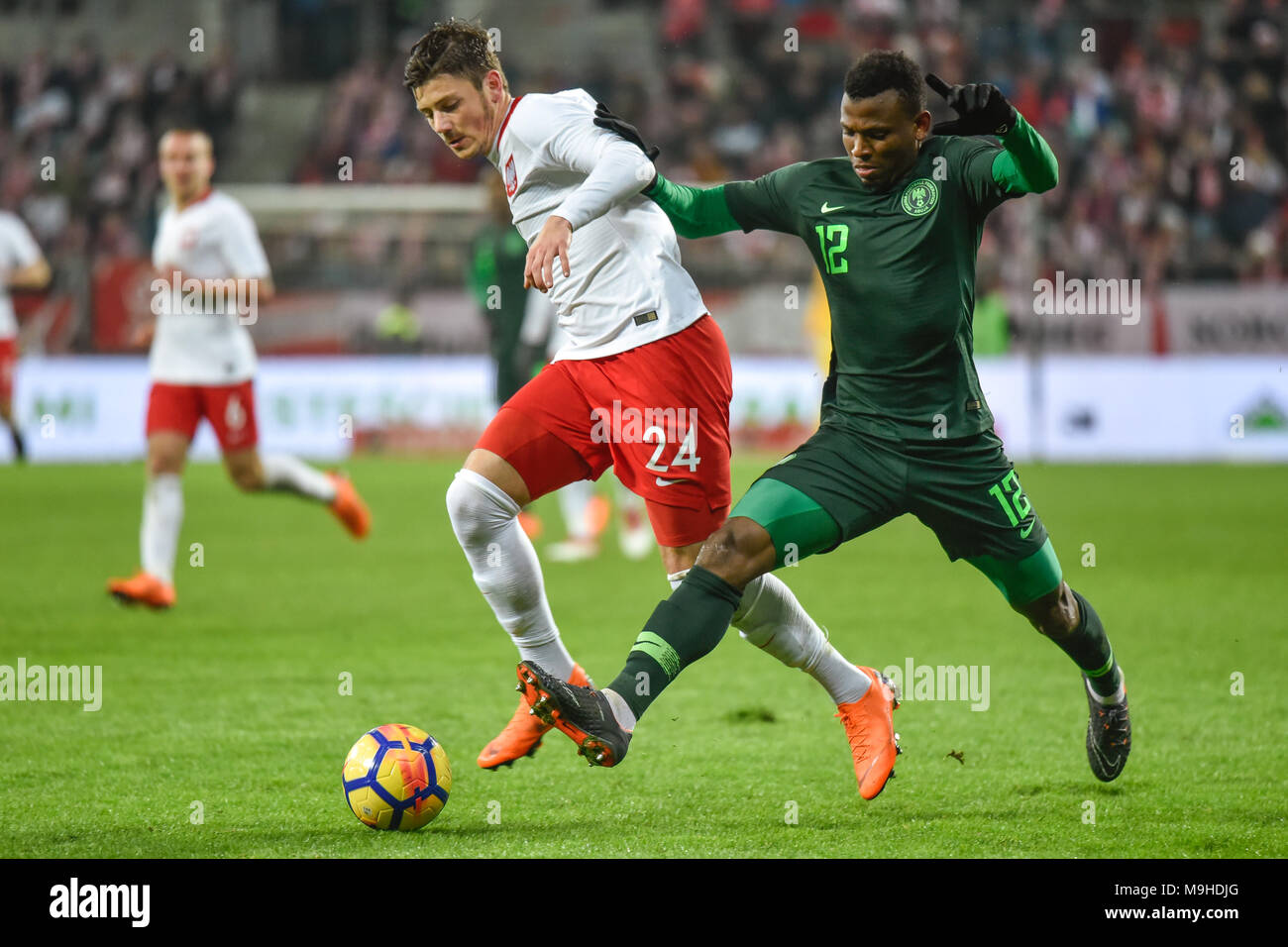 WROCLAW, POLAND - MARCH 23, 2018: Friendly match Poland vs Nigeria 0:1. In action Dawid Kownacki (L) and Abdullahi Shehu (R). Stock Photo