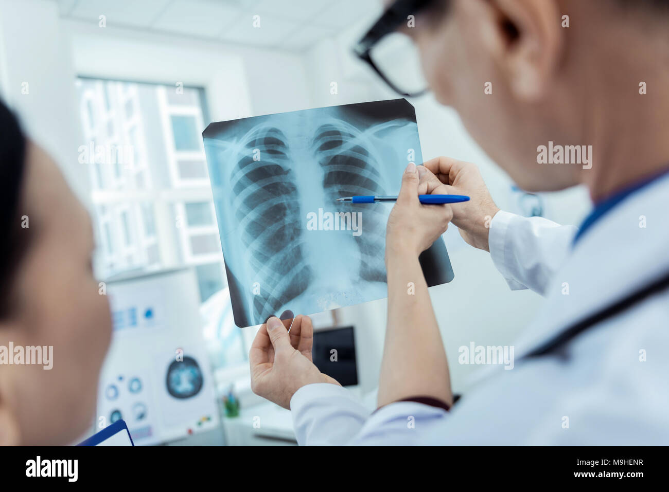 Professional doctos analysing a cheat scan Stock Photo