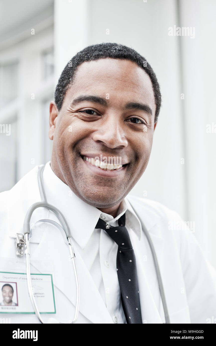 Doctor in black tie stethoscope hi-res stock photography and images - Alamy