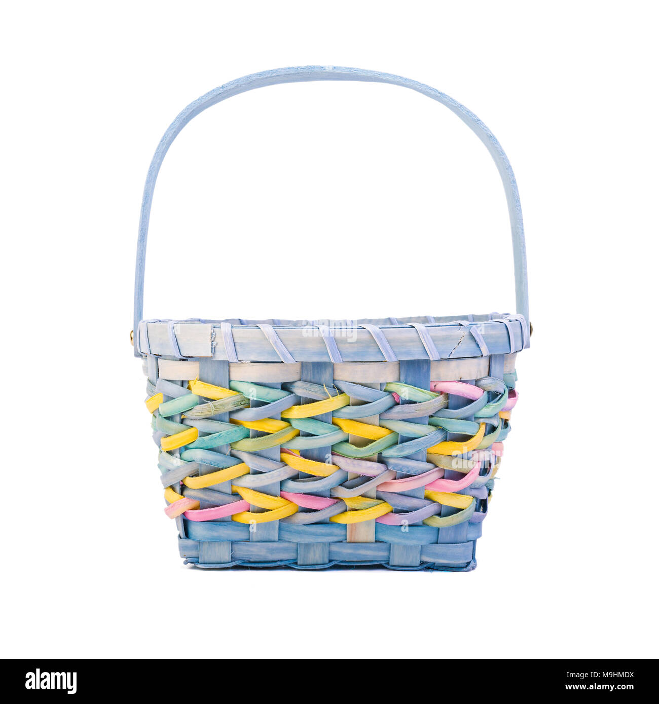 Colourful Easter basket on white. Stock Photo