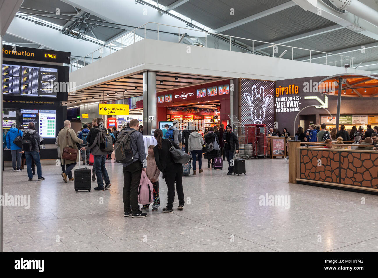 Waiting passengers in the departures area of Heathrow Airport, Terminal