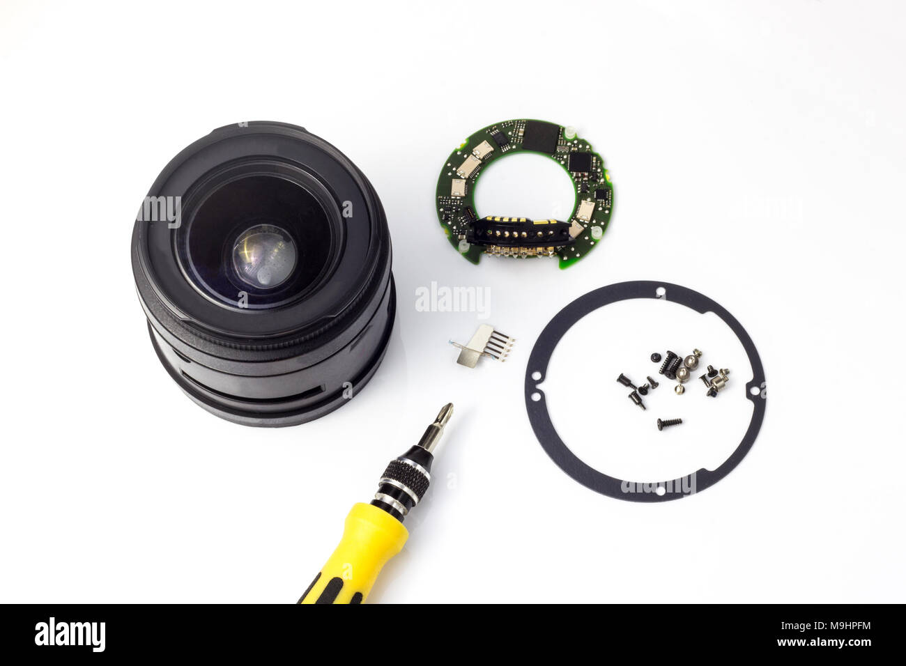 Disassembly and repair of a photo lens, cleaning the glass Stock Photo