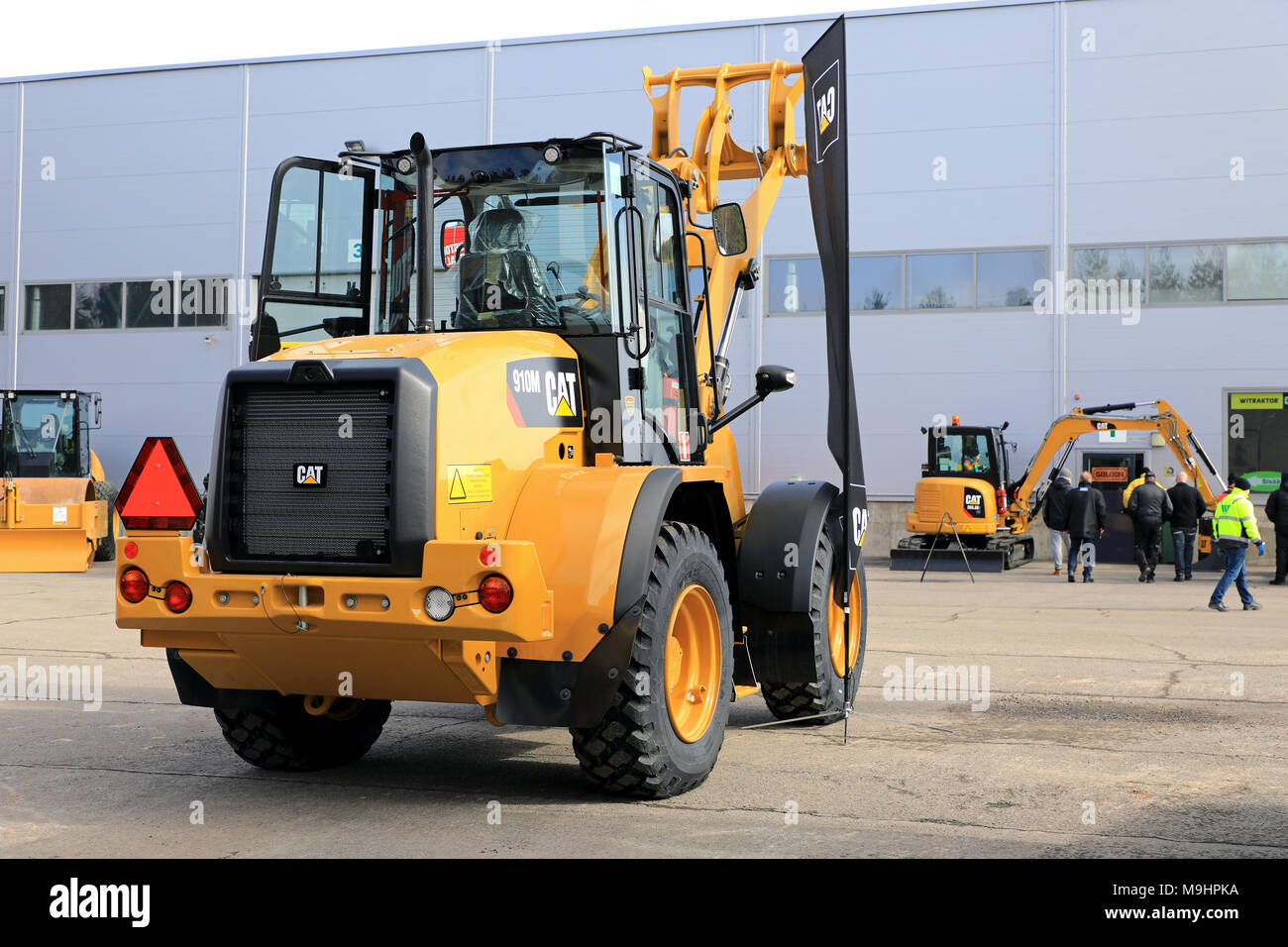 LIETO, FINLAND - MARCH 24, 2018: Cat 910 M compact wheel loader and other Cat equipment at the annual public event of Konekaupan Villi Lansi Machinery Stock Photo