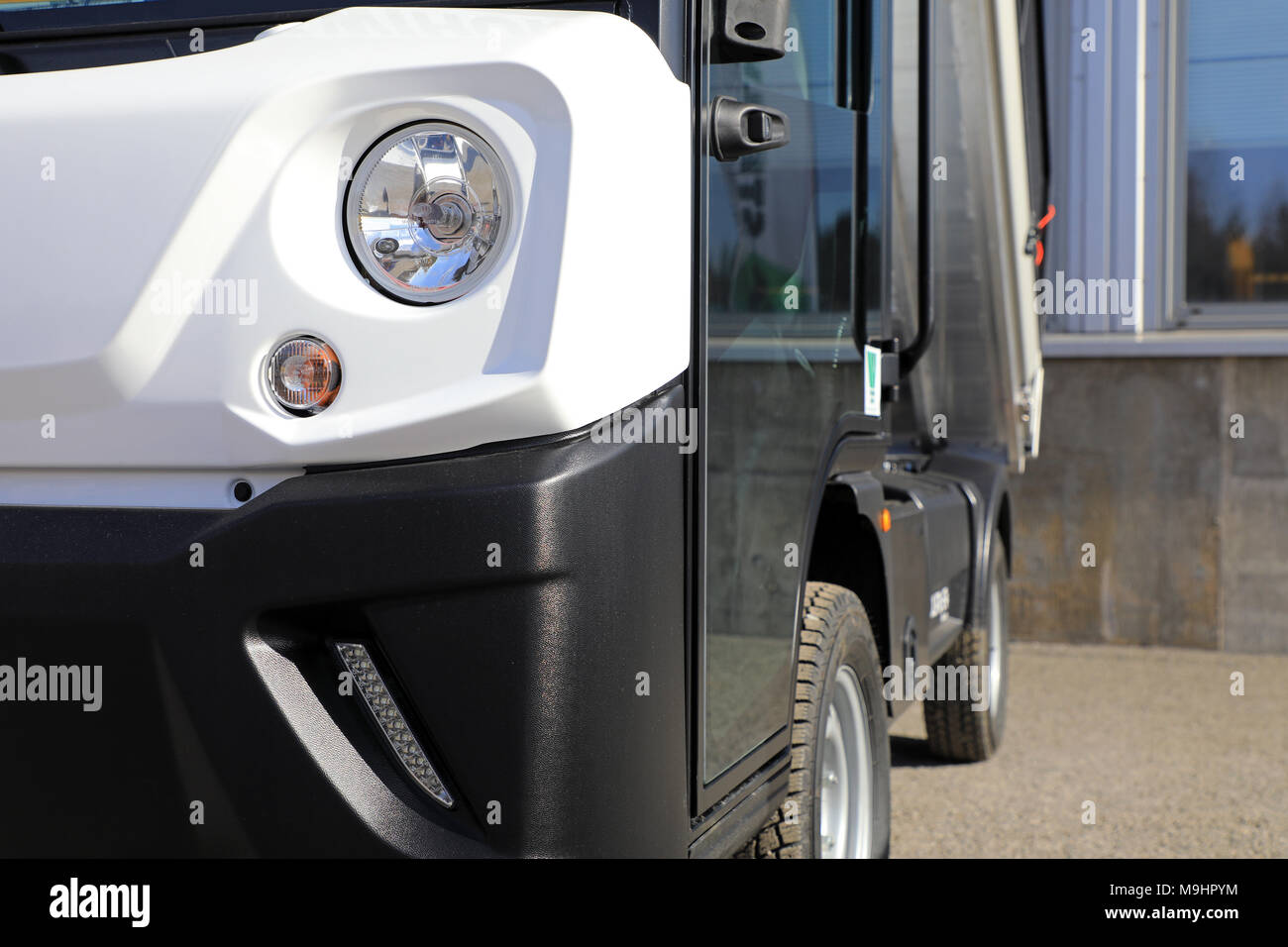 LIETO, FINLAND - MARCH 24, 2018: Headlight detail of Goupil G4 electric utility vehicle seen at the annual public event of Konekaupan Villi Lansi Mach Stock Photo