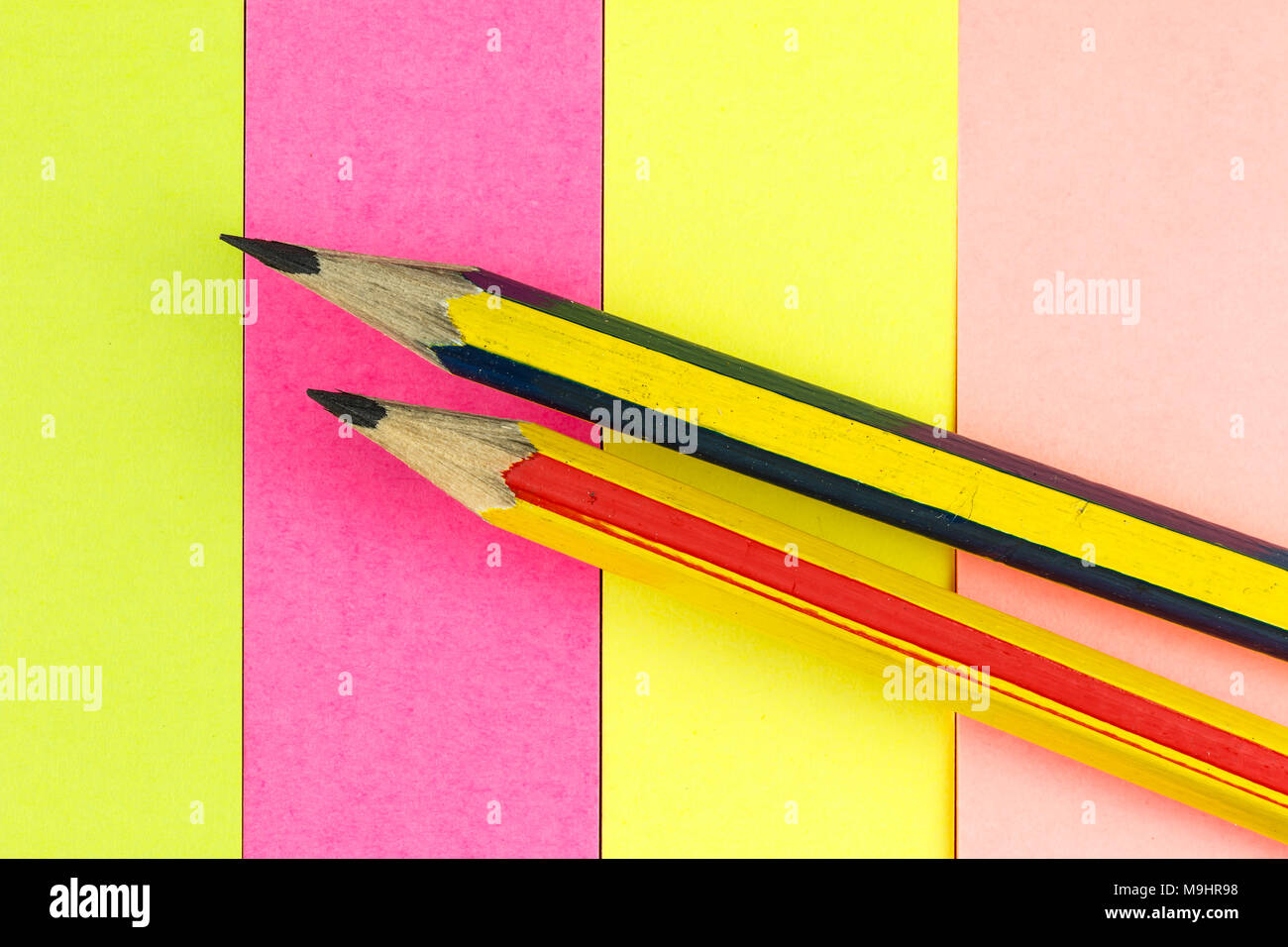 Pencil on colored paper Stock Photo Alamy