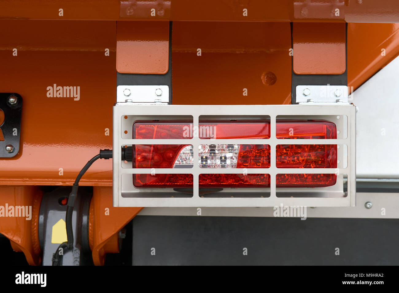 Rear position lamps with metal protective cover on the rear of the truck Stock Photo
