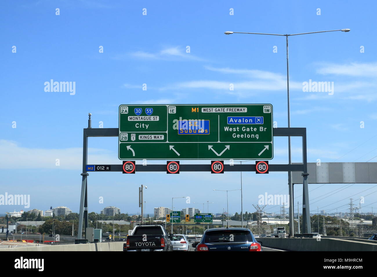Melbourne road sign to West Gate Freeway, South Eastern suburbs, Avalon airport, West Gate Bridge and Geelong Stock Photo