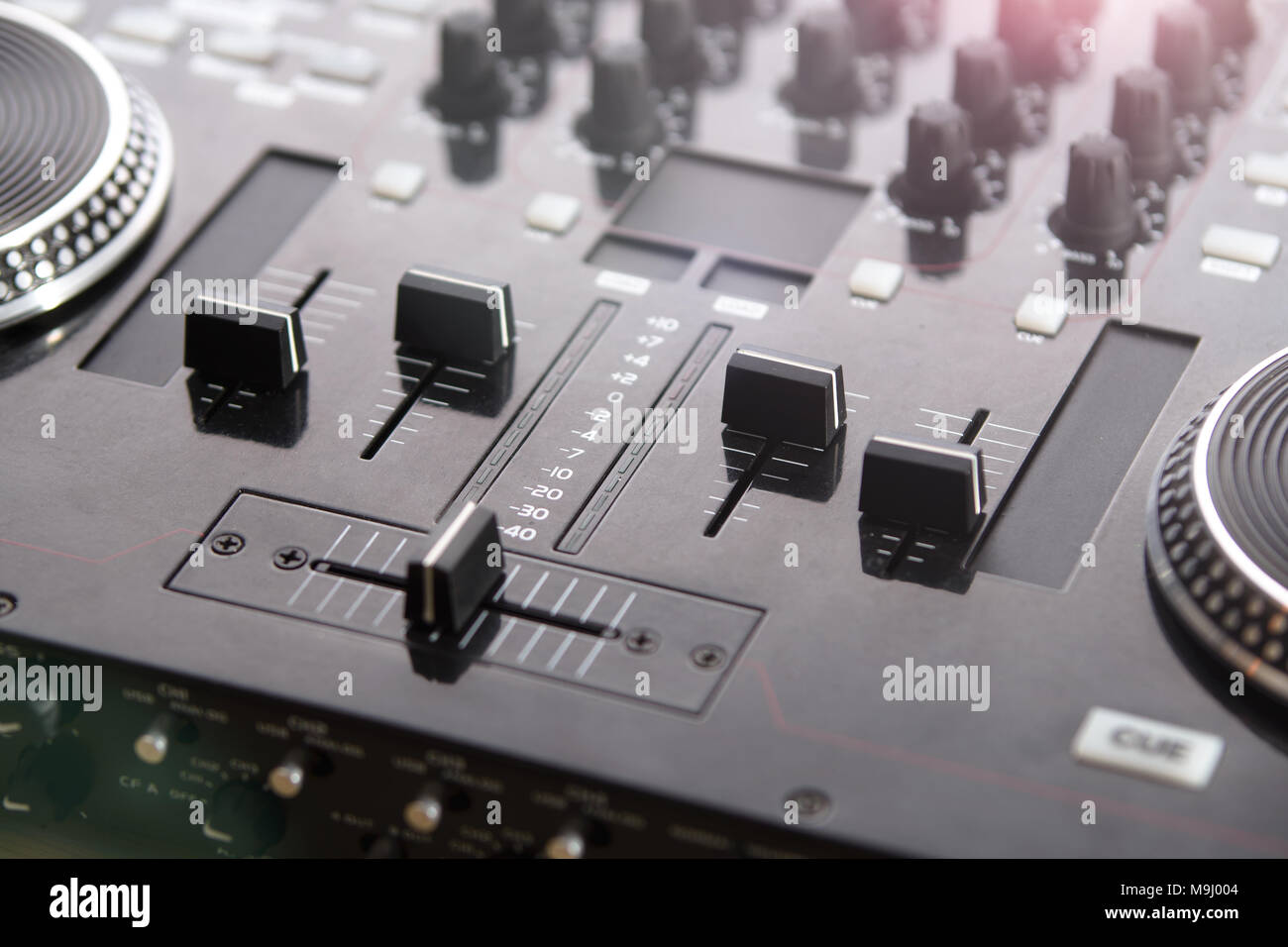 Professional DJ Console with blurred background Stock Photo