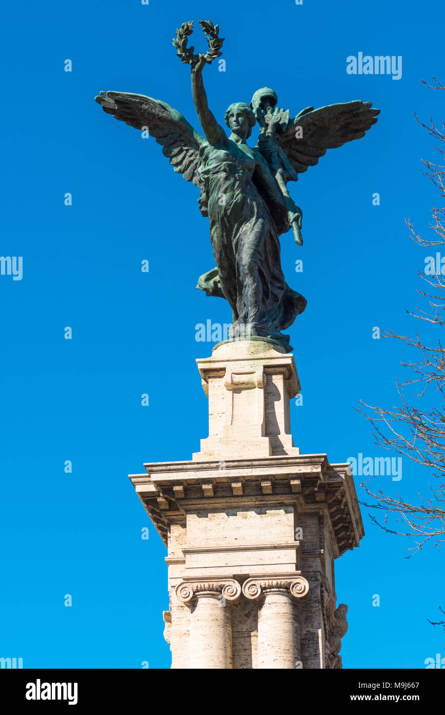 Statue of victory on column at entrance to bridge Ponte Vittorio