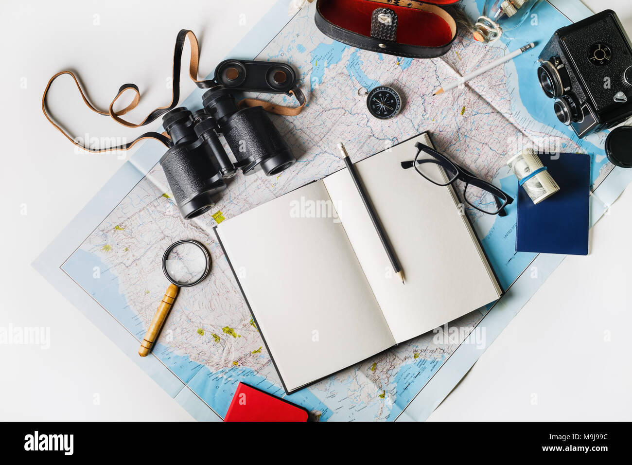 Photo of travel accessories. Top view of personal traveler's items. Flat lay. Stock Photo