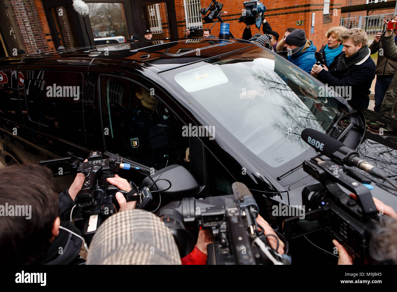 26 March 2018, Germany, Neumuenster: A black van of the police leaves the correctional facility with blue light. Carles Puigdemont, Former President of the Generalitat of Catalonia, was brought here after being detained. Photo: Frank Molter/dpa Stock Photo