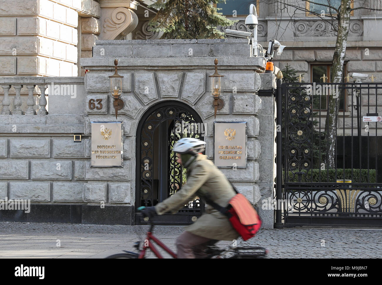 Berlin, Germany. 26th Mar, 2018. A cyclist passes by Russian Embassy in Berlin, capital of Germany, on March 26, 2018. Germany announced Monday that it will expel four Russian diplomats over the poisoning of former double agent Sergei Skripal and his daughter in Britain. Credit: Shan Yuqi/Xinhua/Alamy Live News Stock Photo